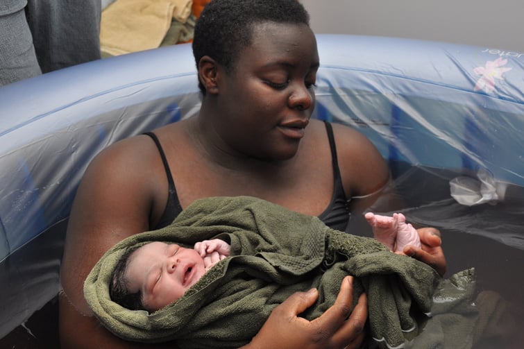 Baby Day~ Water Birth; checking toes